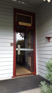 climate control door image at Port Arthur to further control conservation of artefacts and houses.